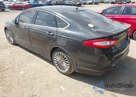 2014 Ford Fusion Hybrid Titanium z USA, uszkodzony, nr VIN 3FA6P0RU1ER289561